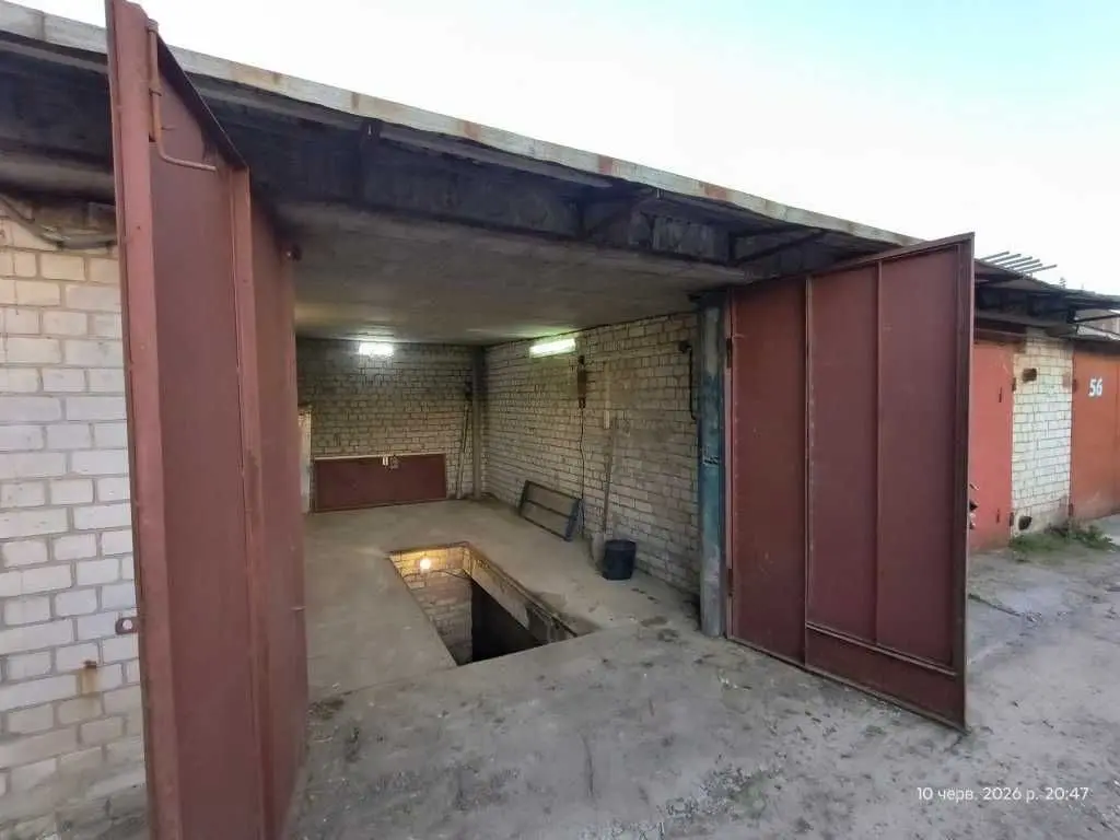 Фото Продаю паркінг, гараж, 41 кв. м, Пухівська вул.  Київ, ціна: 9500 USD, код 5542