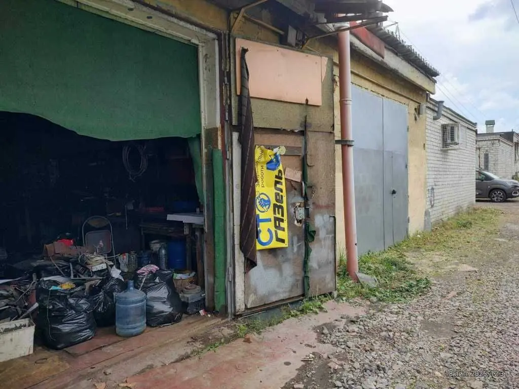 Фото Продаю паркінг, гараж, 132 кв. м, Пухівська вул.  Київ, ціна: 43000 USD, код 5651